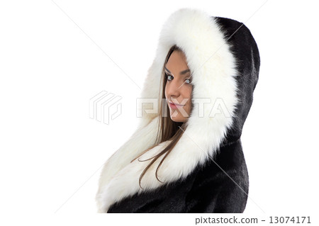 Portrait of the smiling woman in fur coat 13074171