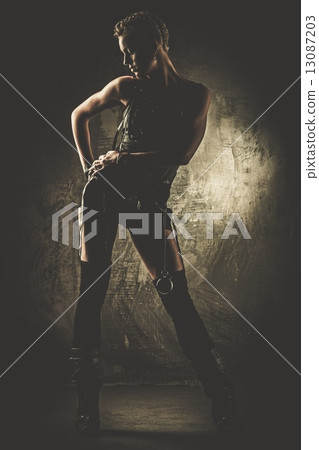 Steampunk girl looking at stopwatch Steampunk girl looking at stopwatch 13087203