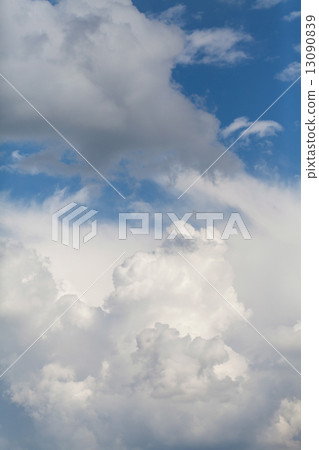 beautiful fluffy clouds in sky 13090839