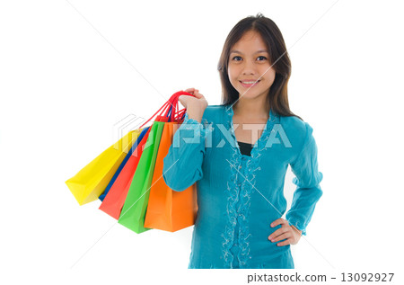 young malay girl in traditional kebaya dress young malay girl in traditional kebaya dress 13092927