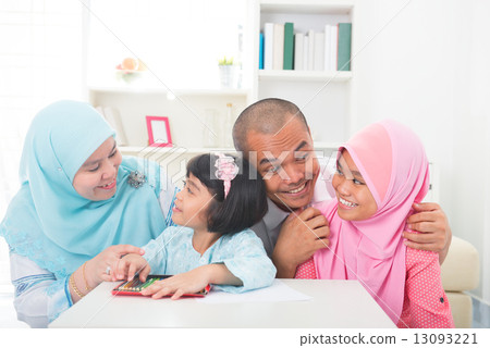 malay family learning together with lifestyle background 13093221