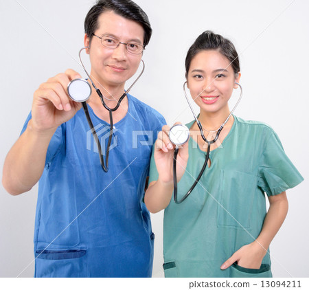 Doctor holding stehoscope Doctor holding stehoscope 13094211