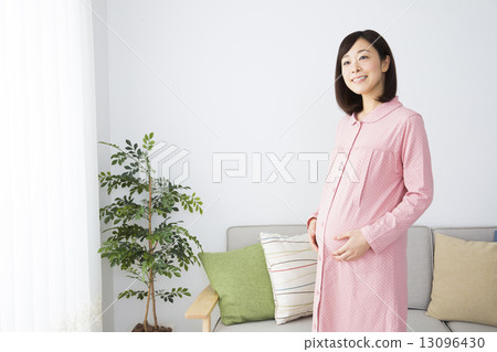 Pregnant woman in pajamas Pregnant woman in pajamas 13096430