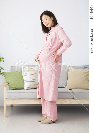 Pregnant woman in pajamas 13096442