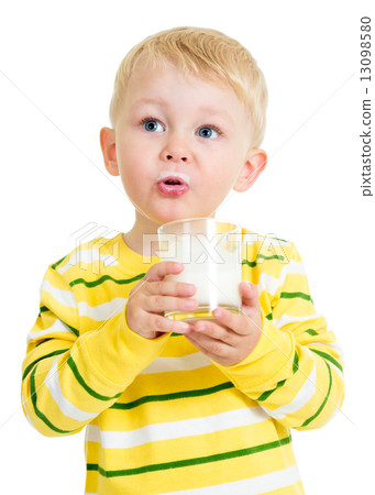 Pretty kid drinking milk from glass Pretty kid drinking milk from glass 13098580