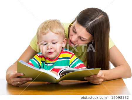 happy mother reading a book to kid happy mother reading a book to kid 13098582