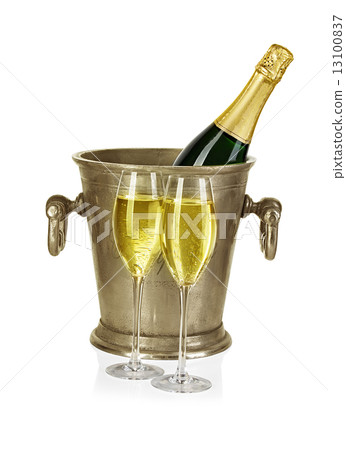 Bottle of champagne  in ice bucket with stemware isolated on white background 13100837