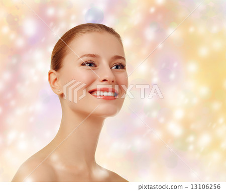 Beautiful happy woman on a colorful background. Colored lights. Beautiful happy woman on a colorful background. Colored lights. 13106256
