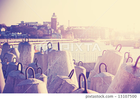 Vintage filtered photo of concrete block breakwater. Vintage filtered photo of concrete block breakwater. 13107500