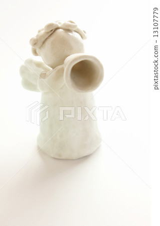 Angel blowing a trumpet (pottery) (vertical forward) 13107779