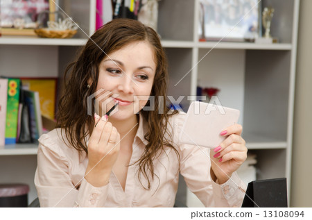 Secretary wears a lip pencil Secretary wears a lip pencil 13108094
