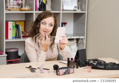 Girl surprised by lipstick Girl surprised by lipstick 13108095