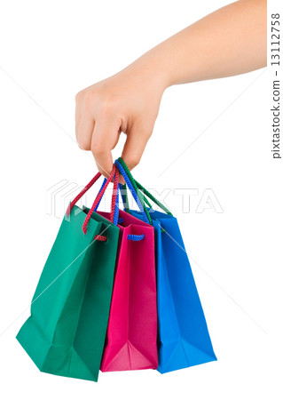 Hand with shopping bags 13112758