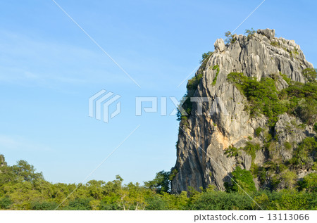 Stone mountains and forests on sky 13113066
