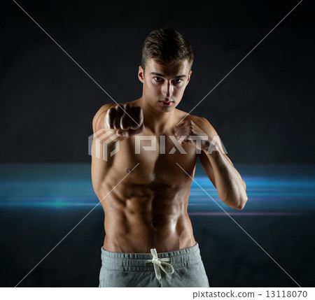 young man in fighting or boxing position 13118070