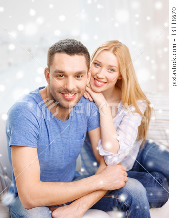 happy couple hugging at home happy couple hugging at home 13118670