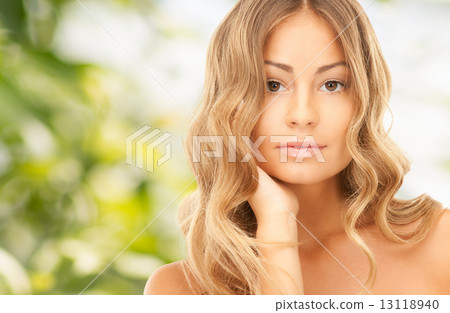 beautiful young woman with bare shoulders 13118940