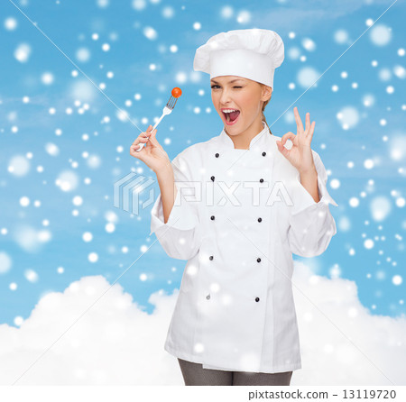 smiling female chef with fork showing ok sign smiling female chef with fork showing ok sign 13119720