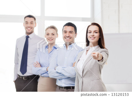 businesswoman in office pointing finger at you businesswoman in office pointing finger at you 13120153