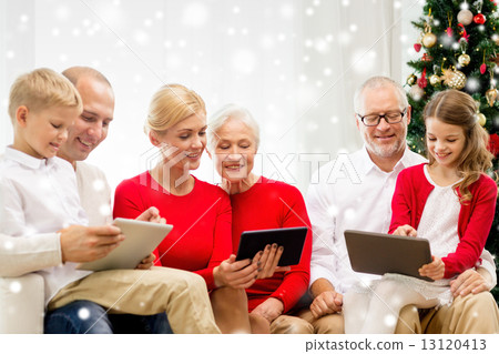 smiling family with tablet pc computers at home smiling family with tablet pc computers at home 13120413