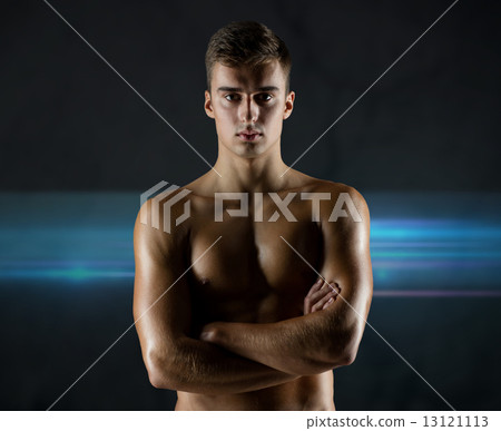young male bodybuilder with bare muscular torso 13121113