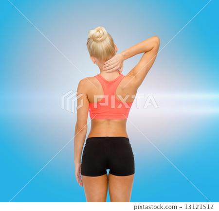 sporty woman touching her neck sporty woman touching her neck 13121512