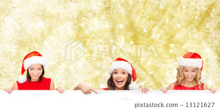 women in santa helper hat with blank white board 13121627