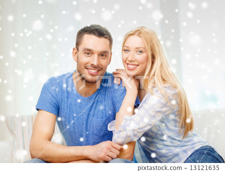 happy couple hugging at home happy couple hugging at home 13121635