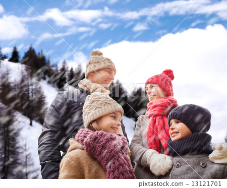 happy family in winter clothes outdoors happy family in winter clothes outdoors 13121701