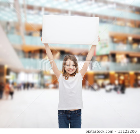 smiling little girl holding blank white board smiling little girl holding blank white board 13122200