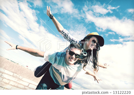 teenagers having fun outside 13122220