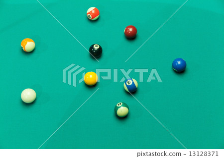 Breaking Pool Balls on green table 13128371