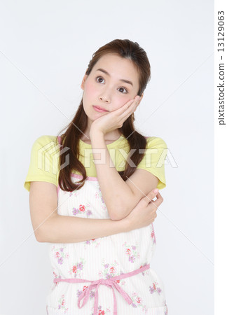 Housewife indulging in thought 13129063