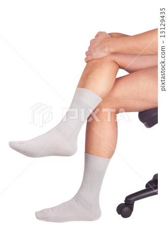 Male legs in socks. Isolated on white Male legs in socks. Isolated on white 13129435