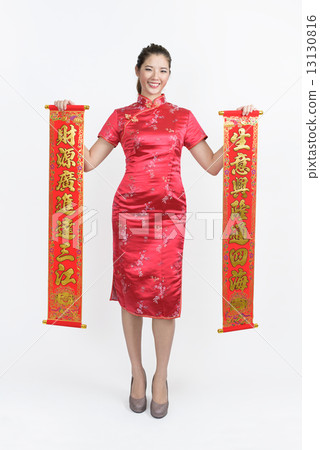 Chinese woman in Cheongsam with red banners wishing good business fortune isolated white background  13130816