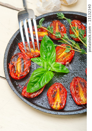 baked cherry tomatoes with basil and thyme 13132340