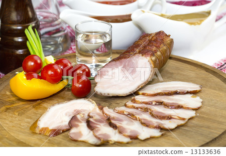 smoked meat on the table in a restaurant smoked meat on the table in a restaurant 13133636