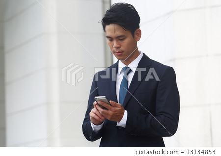 Asian men who mess with cell phones 13134853