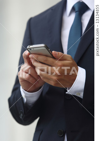 Hand of men who touch mobile Hand of men who touch mobile 13134855