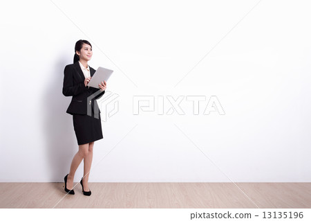 Business Woman with tablet pc 13135196