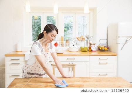 Woman doing housework Woman doing housework 13136760