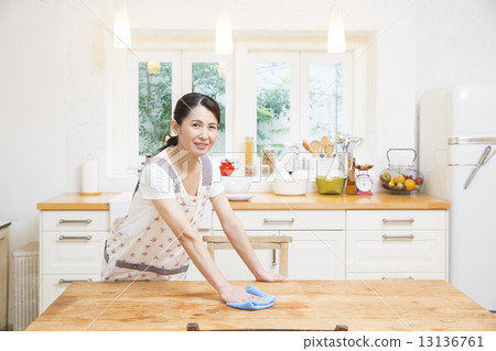 Woman doing housework Woman doing housework 13136761