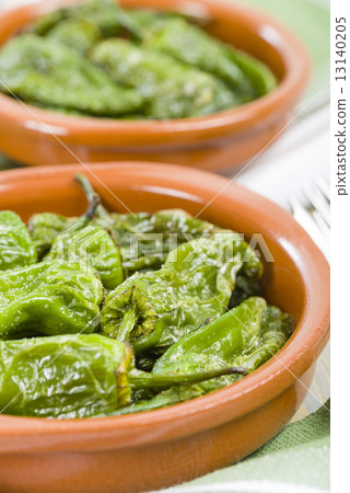 Padron Peppers - Fried Spanish green peppers with olive oil and sea salt. Traditional Spanish tapas. 13140205