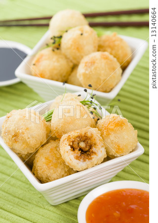 Katsu Chicken Balls - Japanese style breaded and deep fried rice balls filled with chicken curry. Katsu Chicken Balls - Japanese style breaded and deep fried rice balls filled with chicken curry. 13140664