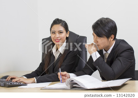 Business man and woman at a discussion 13142020