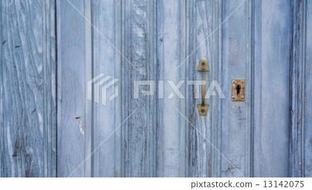 Old blue run-down wooden door and lock Old blue run-down wooden door and lock 13142075