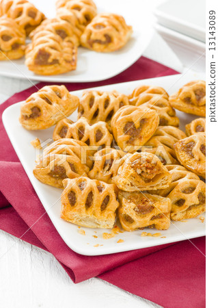 Chorizo Lattice Rolls - Spanish chorizo and red pepper wrapped in pastry. 13143089