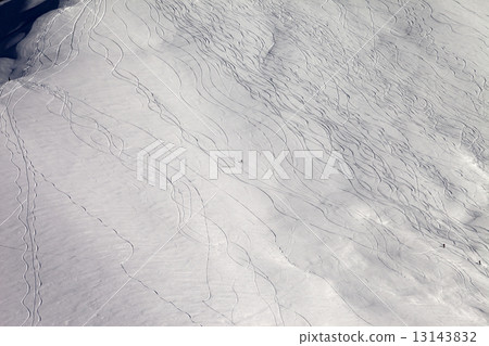 Snowboarders and skiers on off piste slope 13143832