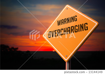 Overcharging on Warning Road Sign. 13144149