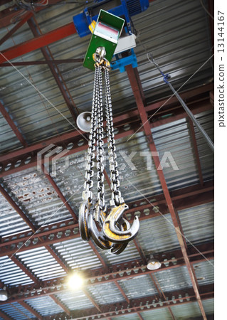 hooks of weigher overhead crane in warehouse 13144167